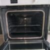 Snapchat-1799213987 Cuisinière induction Brandt blanche