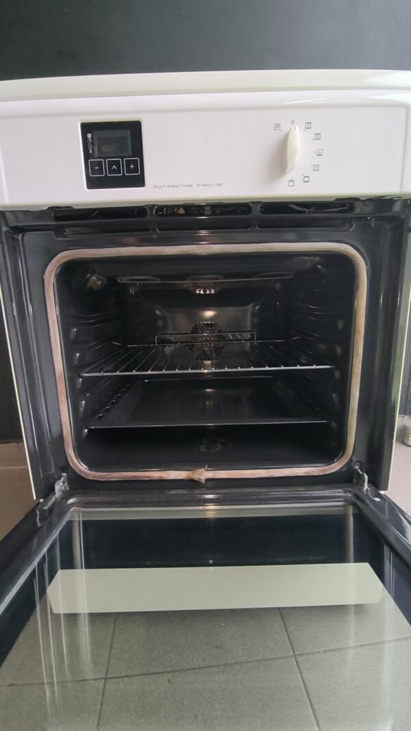 Snapchat-1799213987 Cuisinière induction Brandt blanche