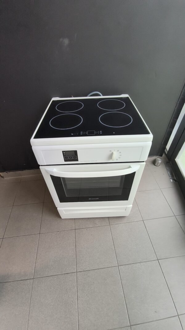 Snapchat-1852444324 Cuisinière induction Brandt blanche